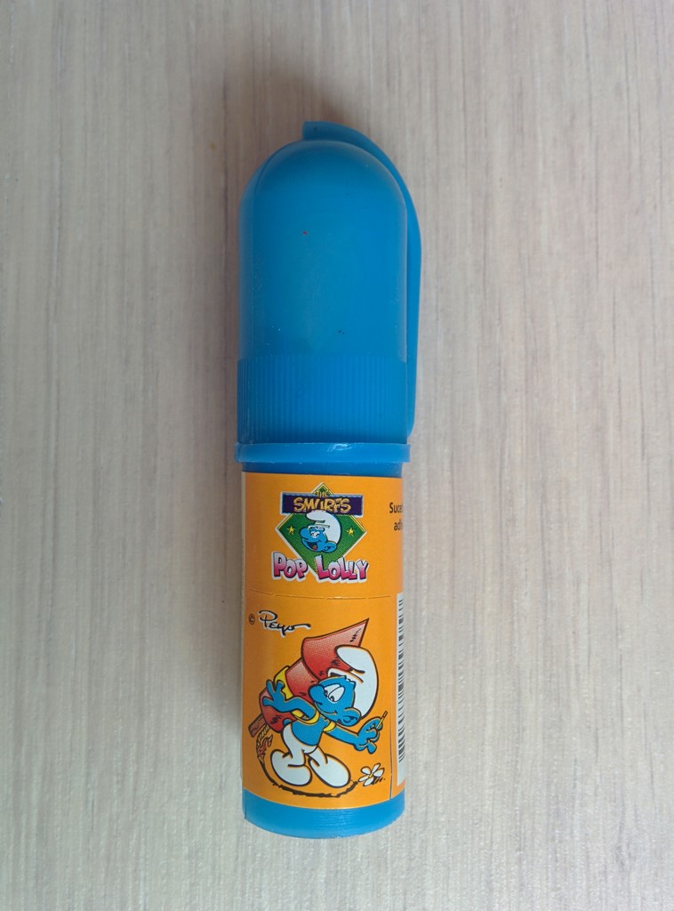 Sucette avec autocollant Schtroumpf avec fusée