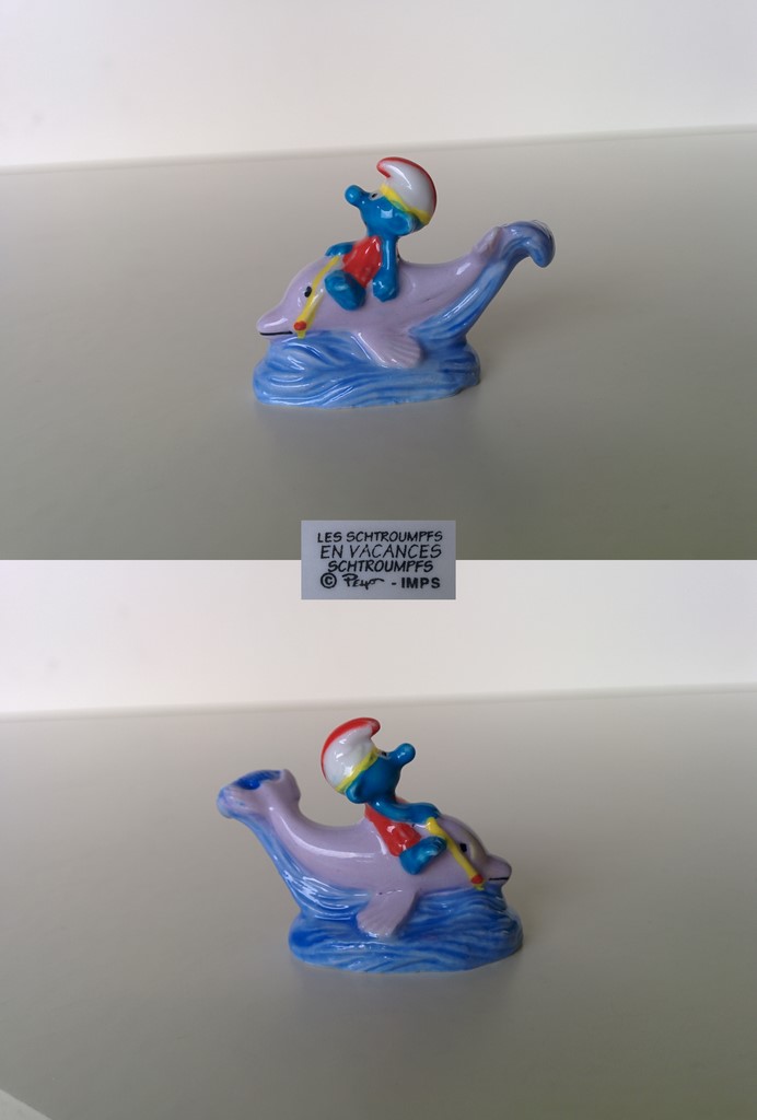 Schtroumpf sur un dauphin