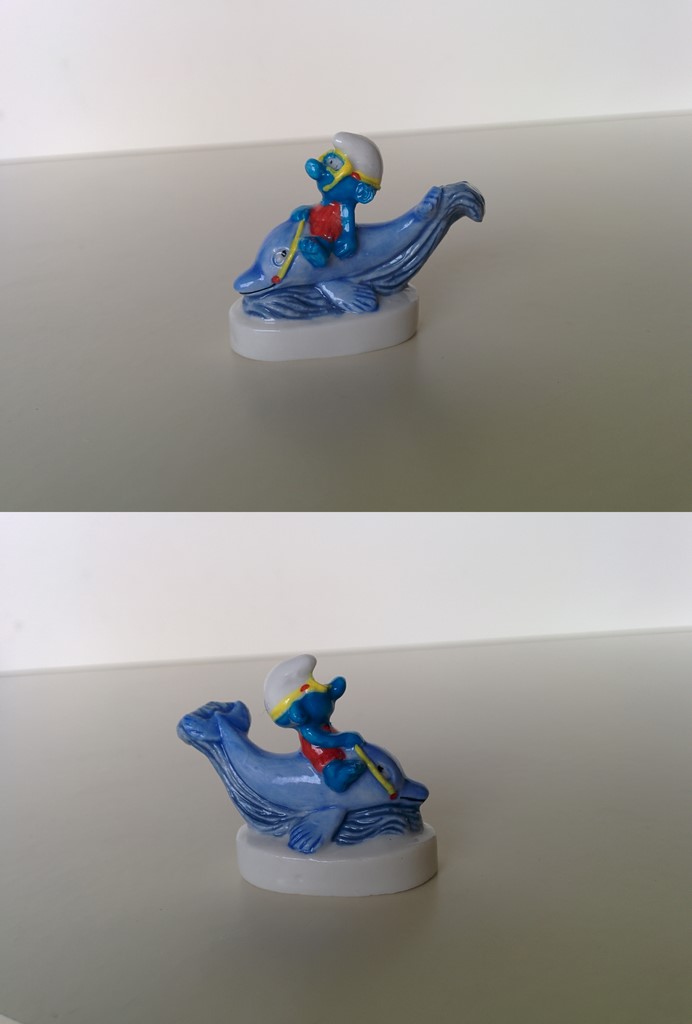 Schtroumpf sur un dauphin