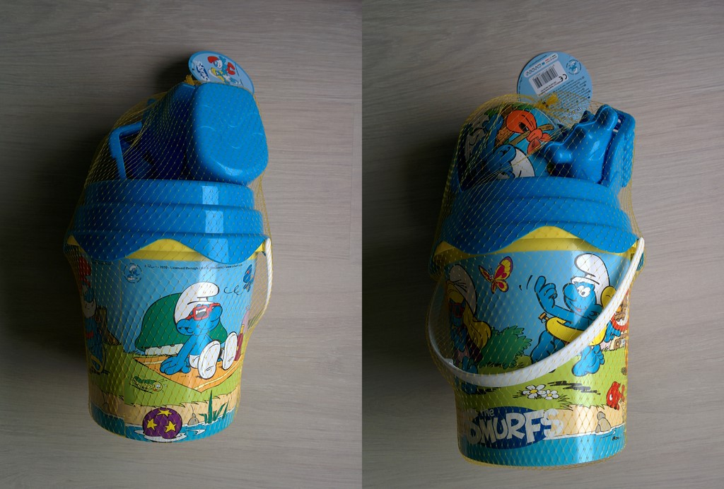 Seau de plage, moules et ballon