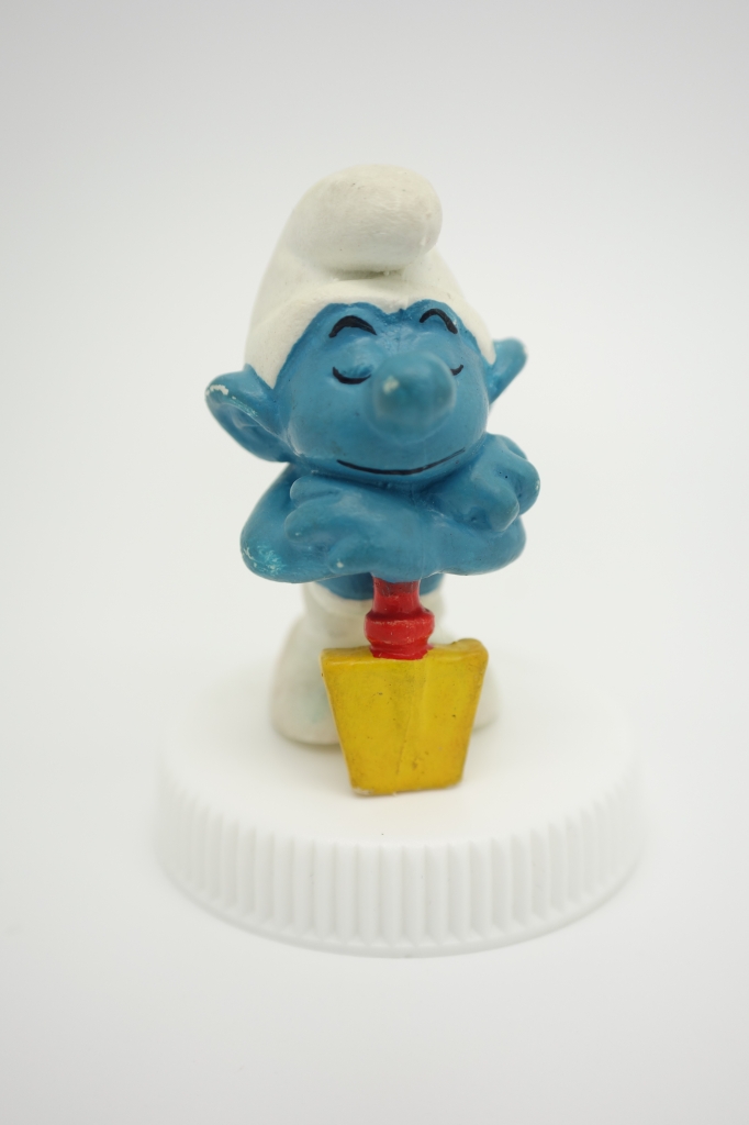 Schtroumpf endormi sur sa pelle (petit)