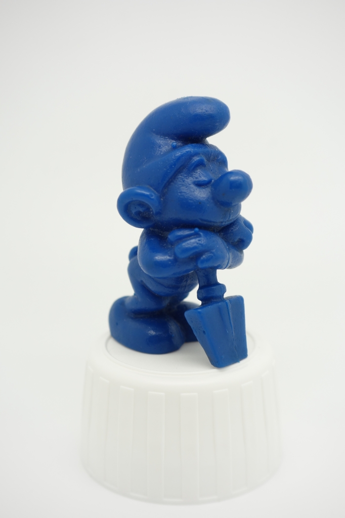 Schtroumpf endormi sur sa pelle (petit)