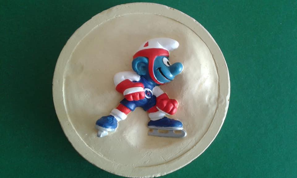 Schtroumpf joueur de hockey sur glace