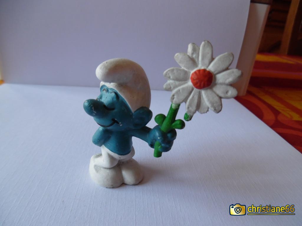 Schtroumpf courtisant avec fleur (rendez-vous)