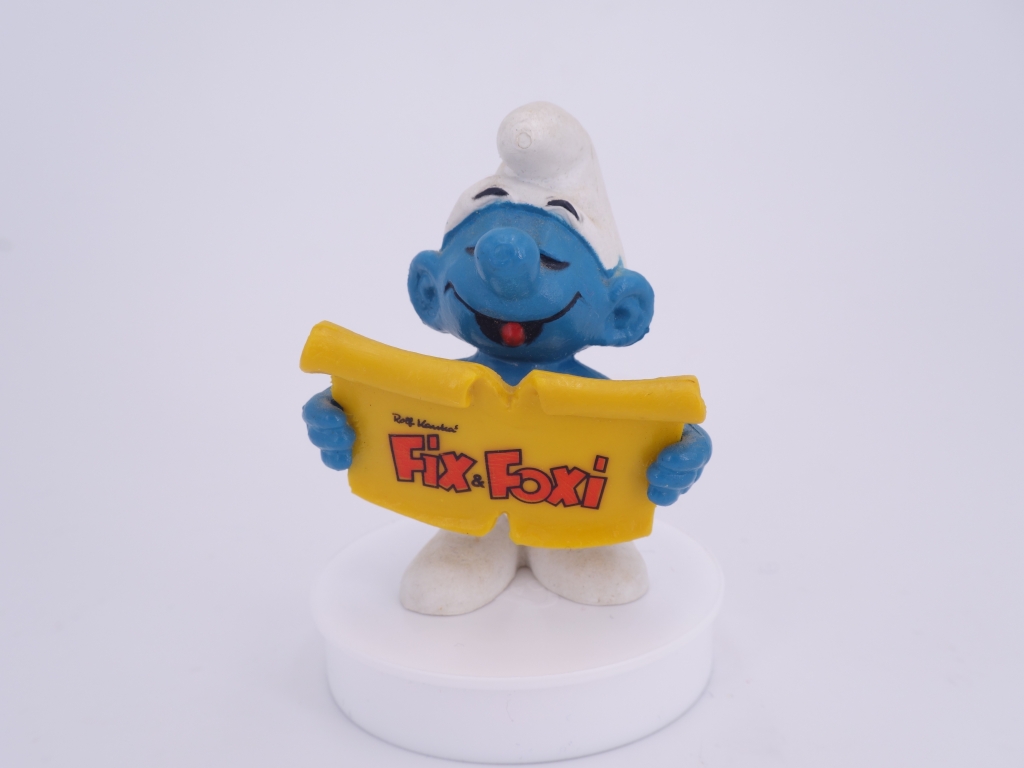 Schtroumpf chanteur avec partition