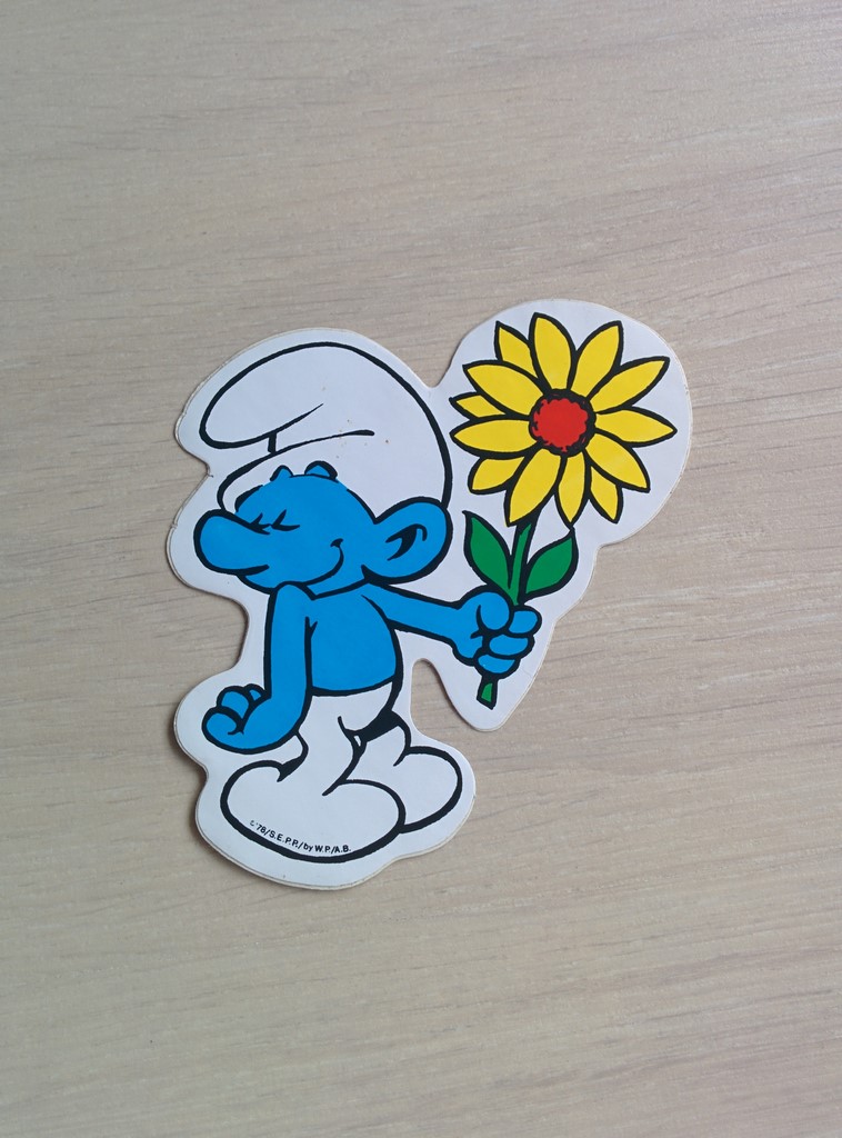 Autocollant Schtroumpf avec une fleur