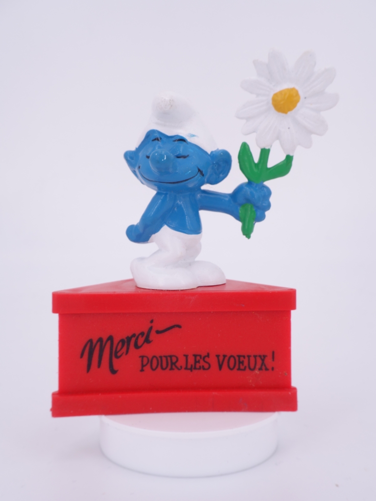 Schtroumpf courtisant avec fleur (rendez-vous)