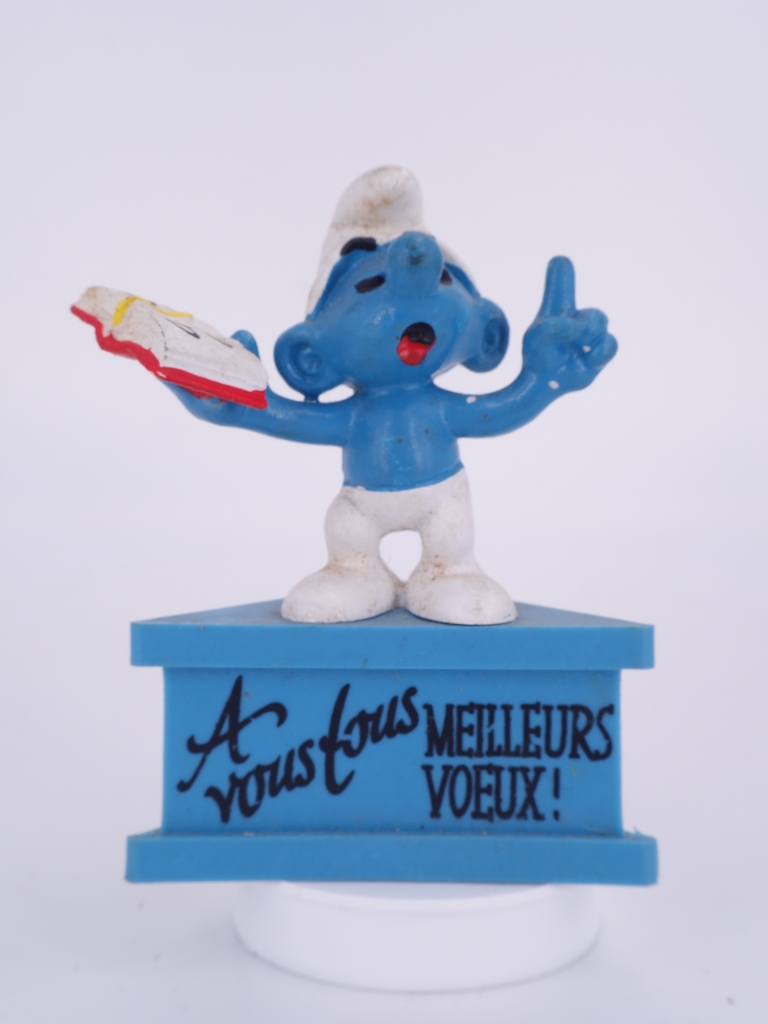 Schtroumpf maitre d'école avec livre