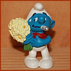 Schtroumpf malade avec fleurs et thermomètre