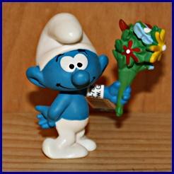 Schtroumpf avec bouquet de fleurs