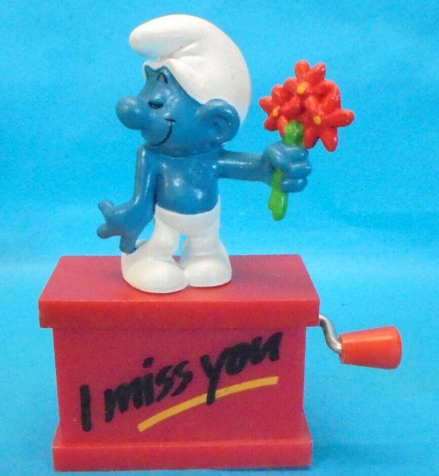 Schtroumpf amoureux avec fleurs