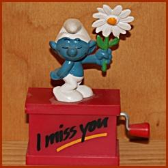 Schtroumpf courtisant avec fleur (rendez-vous)