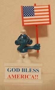 Schtroumpf avec pancarte