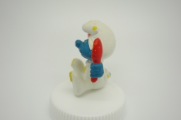 Bébé Schtroumpf avec assiette et cuillère - photo