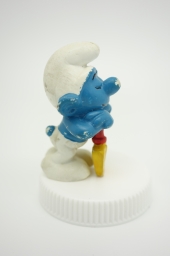 Schtroumpf endormi sur sa pelle (petit) - photo