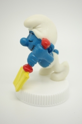 Schtroumpf endormi sur sa pelle (grand) - photo