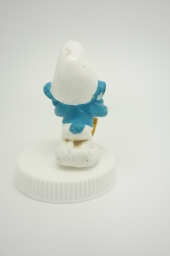 Schtroumpf endormi sur sa pelle (petit) - photo