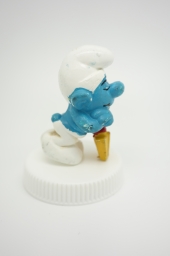 Schtroumpf endormi sur sa pelle (petit) - photo