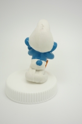 Schtroumpf endormi sur sa pelle (petit) - photo