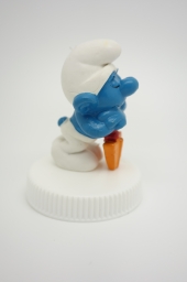 Schtroumpf endormi sur sa pelle (petit) - photo