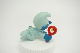 Bébé Schtroumpf avec hochet - photo