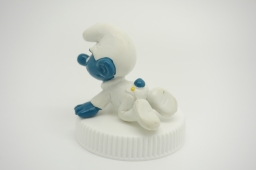 Bébé Schtroumpf avec hochet - photo