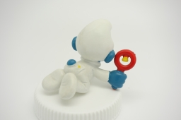 Bébé Schtroumpf avec hochet - photo