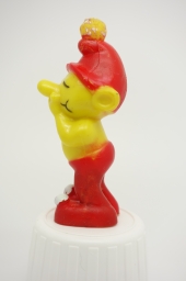 Gnome avec main devant la bouche - photo