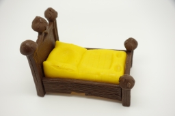 Schtroumpf dormeur dans son lit - photo