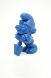 Schtroumpf endormi sur sa pelle (petit) - photo