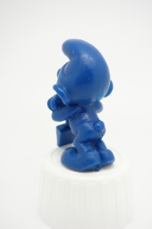 Schtroumpf endormi sur sa pelle (petit) - photo