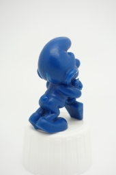 Schtroumpf endormi sur sa pelle (petit) - photo