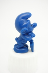 Schtroumpf endormi sur sa pelle (petit) - photo