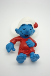 Schtroumpf dormeur dans son lit - photo