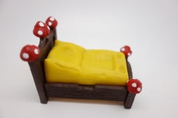 Schtroumpf dormeur dans son lit - photo