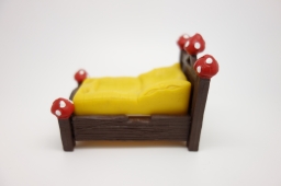 Schtroumpf dormeur dans son lit - photo