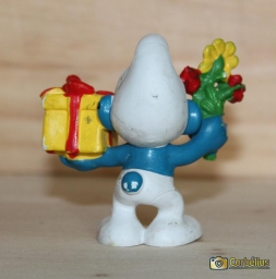 Schtroumpf avec cadeau et fleurs - photo