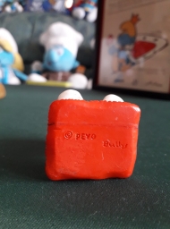 Schtroumpf assis sur un coussin - photo