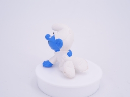 Bébé Schtroumpf avec hochet - photo