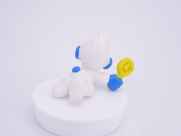 Bébé Schtroumpf avec hochet - photo