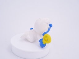 Bébé Schtroumpf avec hochet - photo