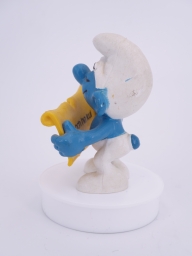 Schtroumpf chanteur avec partition - photo