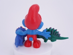 Grand Schtroumpf avec dinosaures - photo