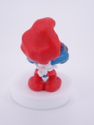 Grand Schtroumpf avec pizza - photo