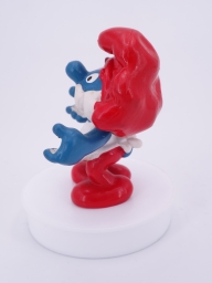 Grand Schtroumpf avec pizza - photo