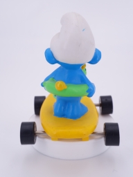 Schtroumpf avec bouée skateboard - photo