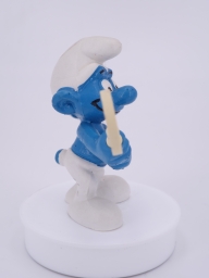 Schtroumpf avec panneau de traffic - photo