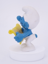 Schtroumpf chanteur avec partition - photo