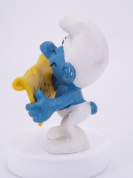 Schtroumpf chanteur avec partition - photo