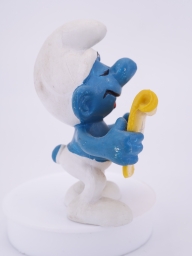 Schtroumpf chanteur avec partition - photo